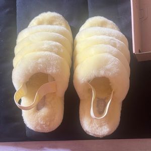 Yellow Ugg Sandals.  They are new.  I purchased the shoes but never wore them.